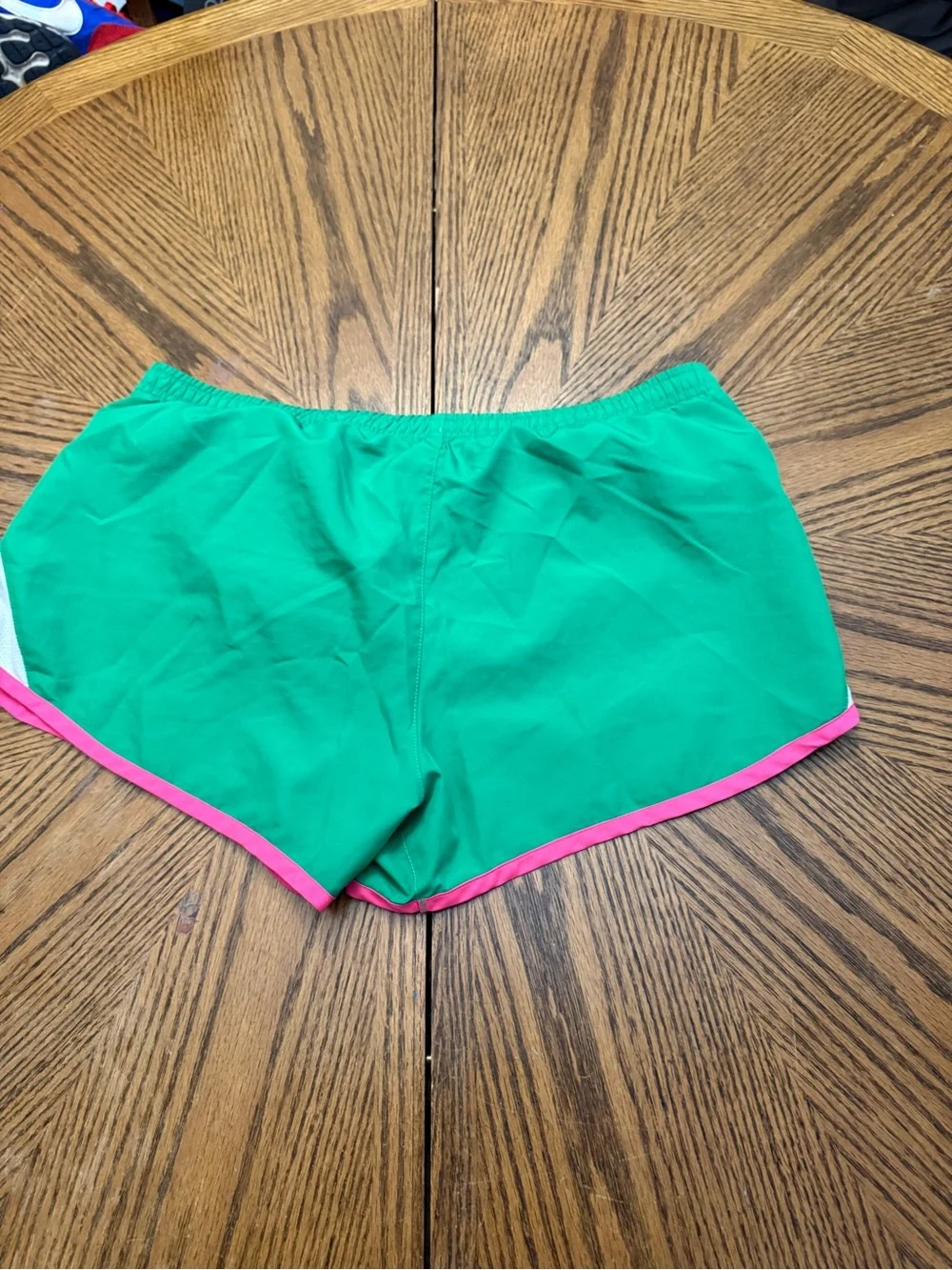 Nike Green Athletic Shorts with Pink Trim